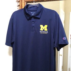 New Men’s Michigan Wolverines embroidered licensed polo shirt. Med. Navy/yellow.